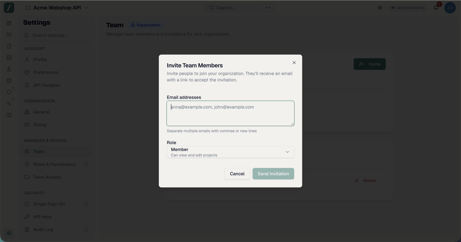 The Invite Team Members dialog with multiple emails and role selection